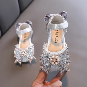 Silver glitter girl's princess sandals with sparkling rhinestone bow and pearl center