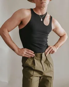 Detail of men's black ribbed slim fit tank top with stylish shoulder cutout design