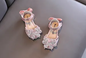 Pink girl's princess sandals with rhinestone butterflies and bow details