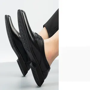Detail view of premium black genuine leather business shoes with anti-slip soft sole