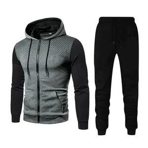 Detailed view of men's sports tracksuit set featuring gradient dot print and zip-up hoodie