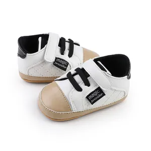 Detail view of stylish white baby prewalker shoes with magic strap and quilted pattern