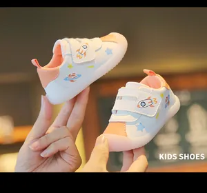 Toddler walking shoes with rocket prints and soft jelly soles