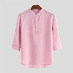 Detailed view of pink men's 3/4 sleeve shirt with a retro stand collar design.