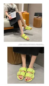 Detailed close-up of lime green canvas buckle sandals with distressed edges
