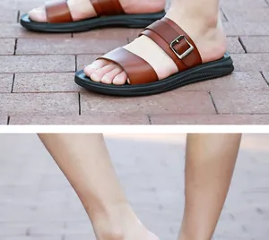 Detail view of stylish men's brown leather sandals featuring adjustable buckles