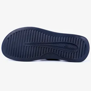 Detailed view of the anti-slip navy blue rubber sole for men's outdoor beach sandals