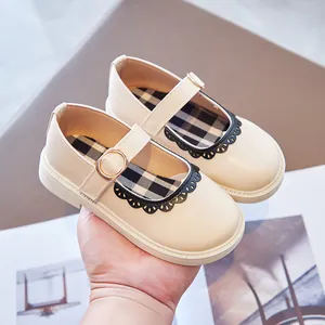 Classic beige girls' Mary Jane shoes with elegant lace trim and soft plaid lining