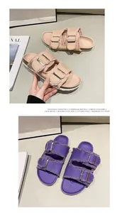 Detail view of casual canvas double buckle flat sandals for women in pink and purple colors.
