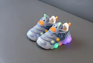 Detail of light-up children's mesh sneakers with colorful LED soles