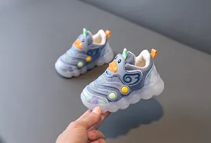 Breathable toddler light-up sneakers featuring a cute duck design and soft sole for walking
