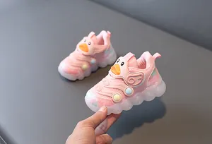 Detailed view of pink LED light-up toddler shoes with cute duck design and breathable mesh