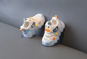 Detailed view of breathable LED light-up toddler sneakers with cute duck design