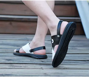 Close-up detail of men's leather outdoor sandals featuring a durable non-slip sole.