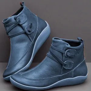 Professional view of blue leather women's British style Martin boots with side decorative ties.