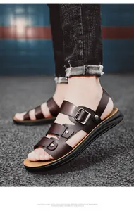Detail view of men's brown breathable summer sandals with adjustable metal buckles