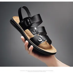 Macro detail of breathable black men's summer sandal with stylish metal buckle and rivets