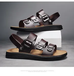 High-quality detail of brown men's sandals featuring metal buckles and durable leather texture