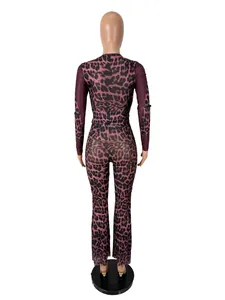 Back view of the burgundy leopard print two-piece set featuring long sleeves and flared pants