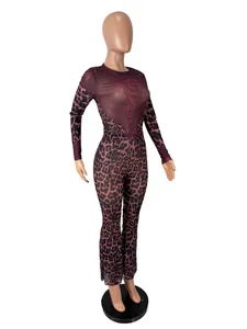 Trendy leopard print high-waist two-piece set with long-sleeved top and flared pants.