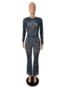 Detailed view of blue leopard print two-piece set with flared pants and long sleeve top
