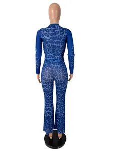 Back view of blue leopard print two-piece set featuring long sleeve top and flared pants