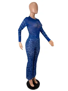 Detailed view of blue leopard print two-piece set with high waist pants and long sleeve top