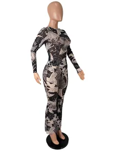 Side-view detail of the high-waisted two-piece set with intricate fish and floral patterns
