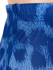 Close-up detail of blue leopard print mesh fabric showing high-quality waistband stitching