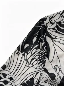 Macro detail view of black and white floral line art print on mesh fabric for women's set