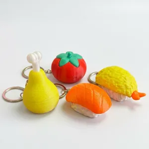 3D printed food series clicker keychain set including sushi and chicken leg models