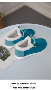 Damen-Schneestiefel aus blauem Cord mit warmem Kunstfellfutter und weißer Sohle