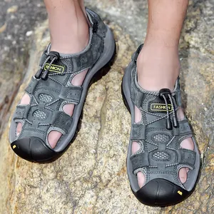 Detail view of men's leather closed-toe sandals with non-slip soles for outdoor beach wear.