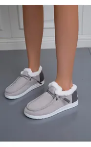 Elegante graue Winter-Loafer für Damen mit dicker Sohle und warmem Kunstfellfutter.