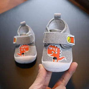 Chaussures de Marche pour Bébé Semelle Souple Antidérapante Motif Dinosaure Velcro Premiers Pas Garçons Filles