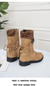 Back view of brown winter ankle boots with knit collar and lace-up detail