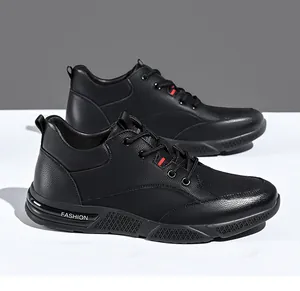 Close-up of black men's casual leather shoes with soft sole and fashion lettering.
