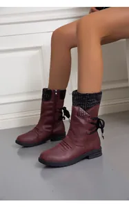 Stylish women's burgundy flat boots featuring knitted sock cuffs and back ribbon detail