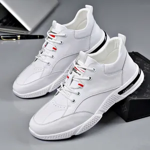 Stylish men's white breathable faux leather sneakers with soft comfortable sole