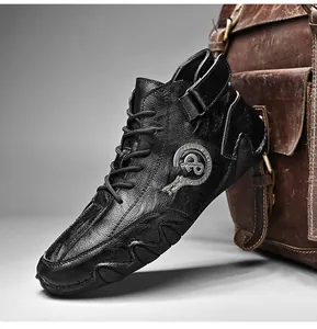 Detailed side view of black leather retro mid-top men's casual shoes with straps.