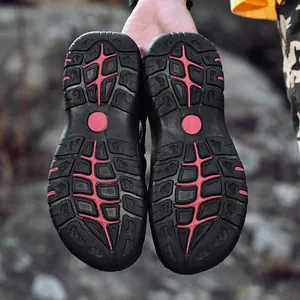 Durable non-slip rubber outsoles of men's outdoor closed-toe beach sandals in black and red