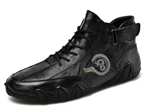 Classic black leather men's casual high-top shoes with velcro strap detail.