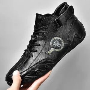 Handmade black mid-top casual men's driving shoes with velcro strap and vintage style.
