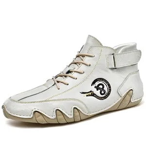 Hand-stitched men's white mid-top casual shoes with velcro strap and non-slip sole