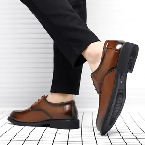 Elegant brown leather business dress shoes for men with a vintage polished finish