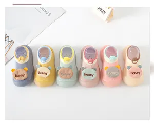 Six pairs of colorful cartoon baby walking sock shoes with soft non-slip rubber soles.