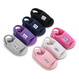 Collection of colorful baby walking shoes with breathable mesh and soft rubber soles.