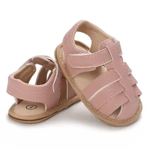 Soft sole baby sandals in pink featuring a comfortable strap design for infants