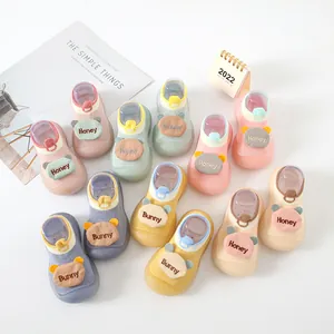 Cute cartoon animal baby sock shoes with non-slip rubber soles in multiple pastel colors