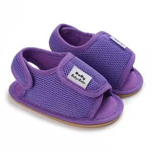 Detailed view of breathable purple mesh baby walking shoes with soft rubber sole